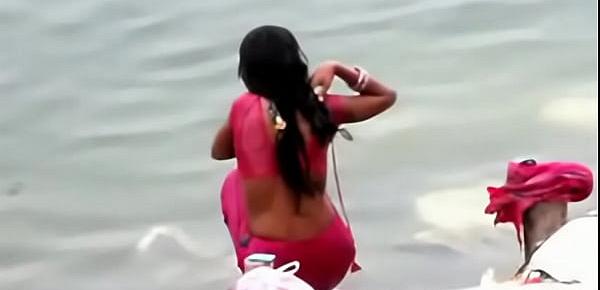  Indian woman bathing in ganges river backless open